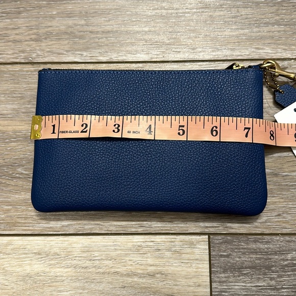 COACH WRISTLET PEBBLE LEATHER TRUE BLUE SMALL NWT - Picture 6 of 7